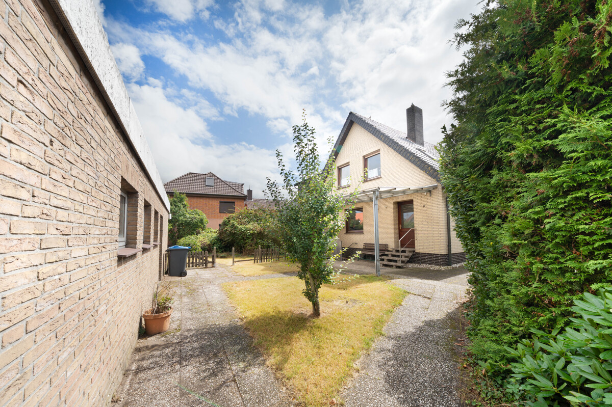 Langwedel | Großzügiges Wohnhaus mit Garten, Keller und Garage sowie aktuell vermietetem Obergeschoss