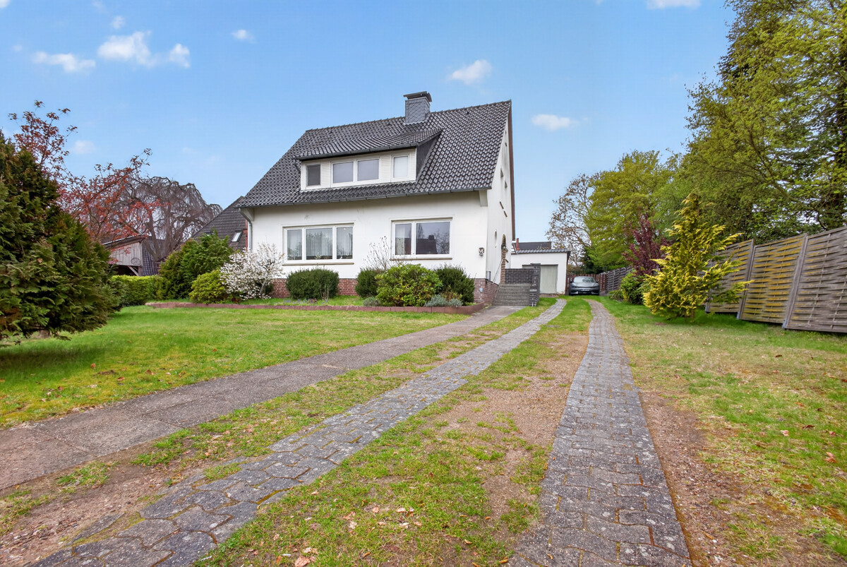 Bruchhausen-Vilsen | Vielseitiges Einfamilienhaus in zentraler Lage mit Garten und Garage