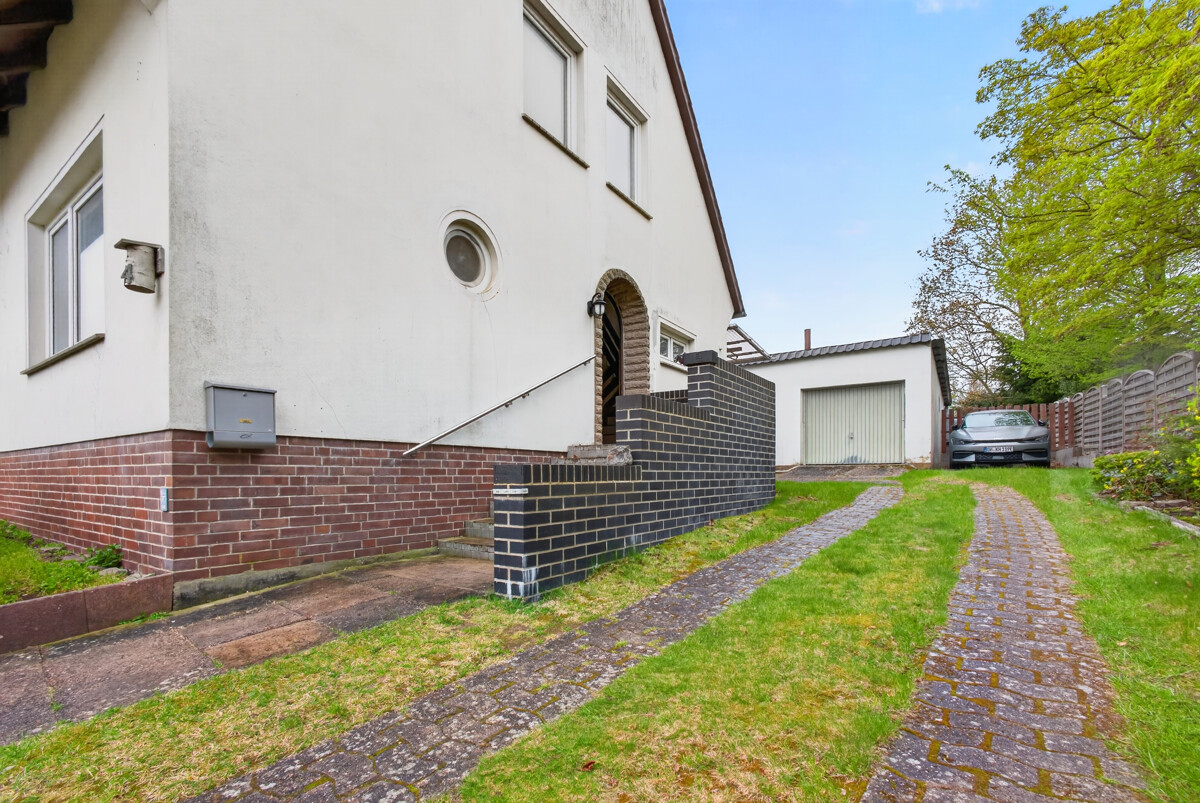 Bruchhausen-Vilsen | Vielseitiges Einfamilienhaus in zentraler Lage mit Garten und Garage